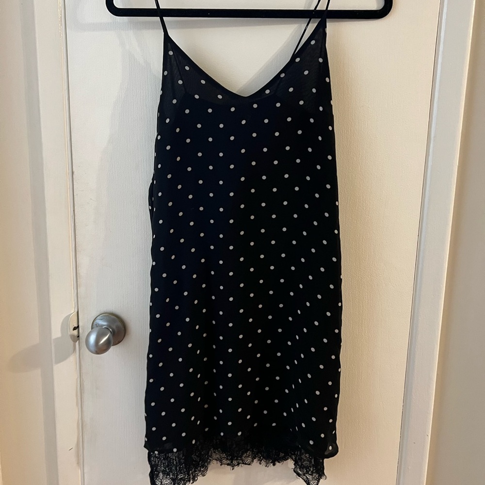 Poka dot spaghetti strap midi dress.